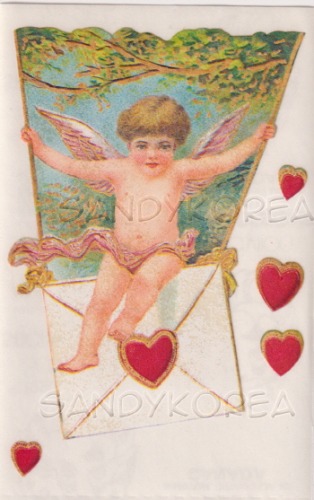 Vintage Cupid on Swing