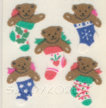 Fuzzy Teddy Bear in Christmas Socks